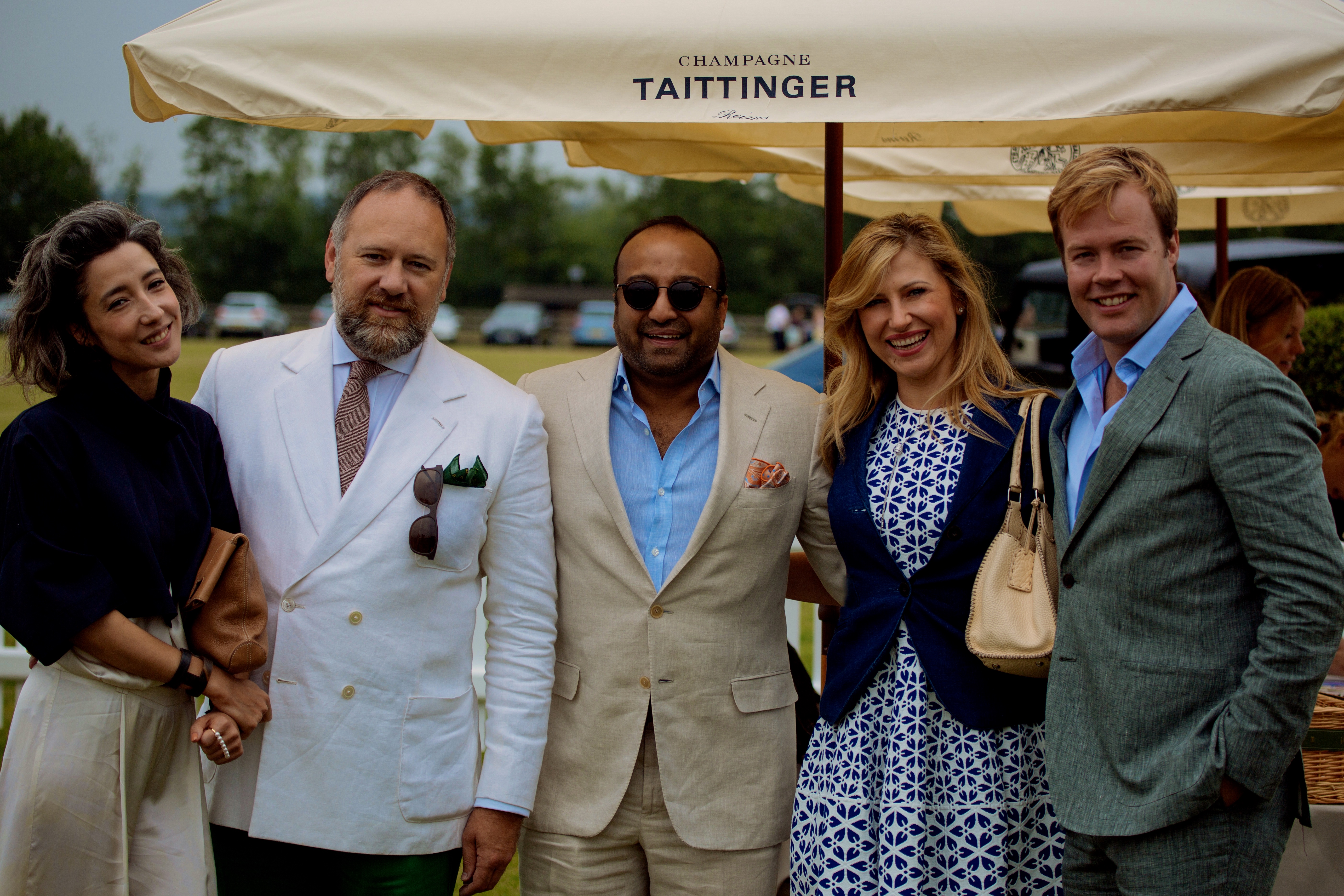 From the left, Mimi Durand Kurihara, David Leppan, Chairman of Wealth-X and the founder of World-Check, Ron Wahid, CEO of RJI Capital, his fiancée, art consultant Magdalena Kruszewska and Ed Olver, CEO of British Polo Day at the event held on June 20 in Henley-on-Thames.