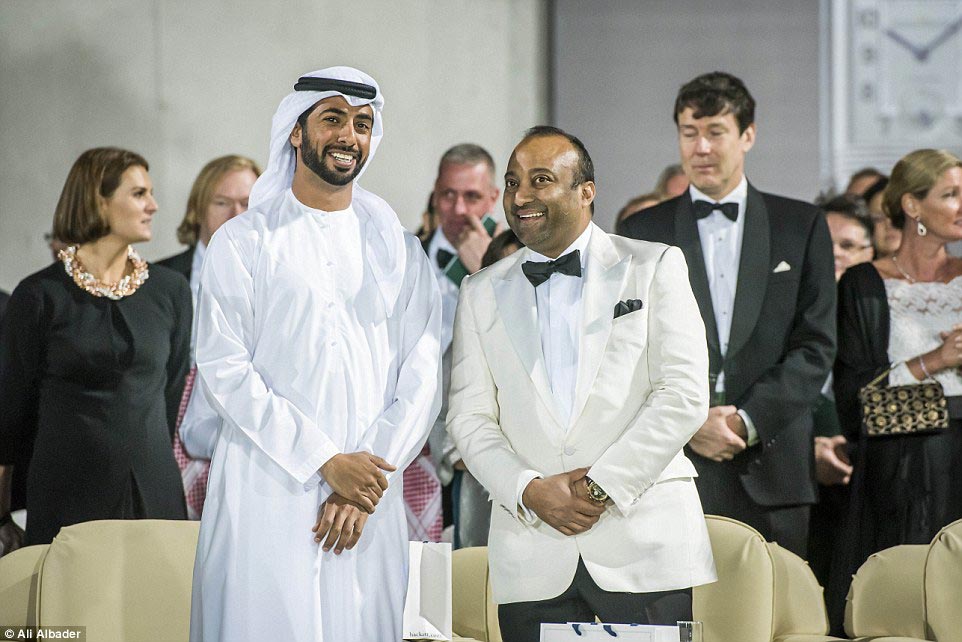 HH Sheikh Mohammed Al Nayhan Bin Nayhan and Ron Wahid - British Polo Day Abu Dhabi's main backer - stand for the national anthems before the start of the polo